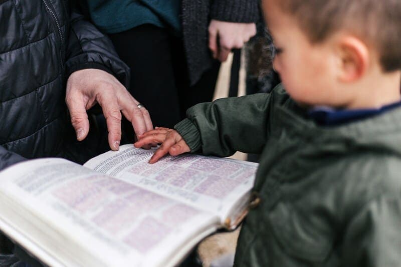 child reading the bible